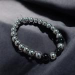 اسورة هيماتيت مزينة بثلاث خرزات عقيق اسود